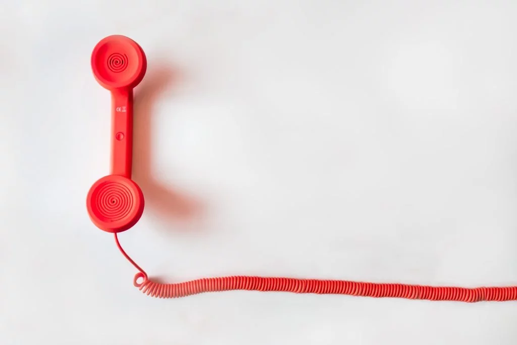 Red corded telephone vintage retro phone line